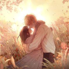 two people are kissing in the middle of a field with flowers and trees behind them