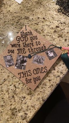 a graduation cap with the words, i think god not were there to see me through this one's for you