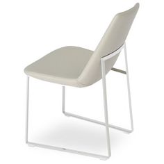 a white chair sitting on top of a metal frame with an upholstered seat