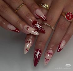 Classic red and nude nails featuring delicate bows and cherry accents—perfect for a festive yet sophisticated holiday look! ❄️🎄

#HolidayNails #ChristmasNailArt #RedNails #FestiveManicure #ElegantNails #BowNails #NudeNails #ChicNails #PinterestNails #Xiaohongshu Cherry Nail Art, Girls Nail Designs, Red Acrylic Nails, Elegant Nail Designs, Nude Nail Designs, Red Nail Designs, Almond Nails Designs