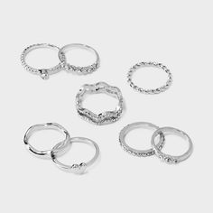 Eight-piece ring set from Wild Fable™ with silver tones and varying designs. Includes heart signet rings, crystal rings, band rings and more. Great for pairing with your favorite necklaces and earrings. If you’re not satisfied with any Target Owned Brand item, return it within one year with a receipt for an exchange or a refund. Wild Fable™: A look for every story. Pretty Rings Silver Set, Rings Silver Sets, Fake Silver Ring, 6 Pack Rings, Dainty Silver Rings Set, Cute Cheap Silver Jewelry, Saniro Ring, Coqquete Rings, Simple Silver Rings