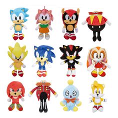 a bunch of stuffed animals that are in the shape of sonic and knuckles characters on a white background