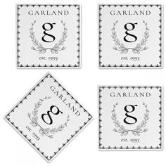 four square coasters with the letter g and three smaller ones in black and white