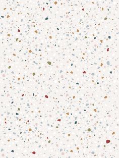 a white background with multicolored speckles on the bottom and bottom half