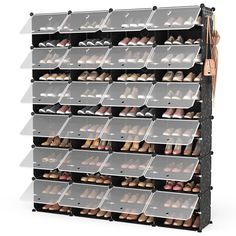 the shoe rack is filled with many pairs of shoes and bins for each pair