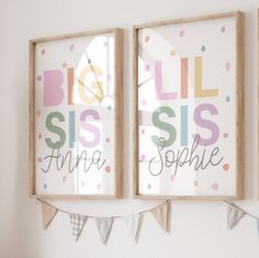 two framed pictures hanging on the wall next to each other with bunting streamers