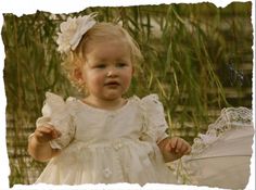 A Memory To Behold £280.00  This Beautiful timeless christening gown is lovingly made with dupioni silk, and hand embroidered with a French mesh overlay on the skirt.   The matching bonnet is included making this the perfect christening dress for your special little angel! Your Special