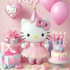 a hello kitty birthday cake with balloons and presents