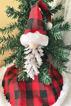 a santa hat on top of a christmas tree