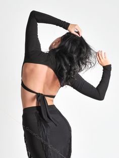 "Crop top for dancing with a high neck and an open back. The stylish top fits the figure well, and the drawstring emphasizes the waist. The belt can be tied on the front or back of the product, so you will be in a new look at every workout. The high neckline accentuates the neck and adds elegance to the look. INDIVIDUAL TAILORING If you want to change the style of clothes (shorten, make it longer, add a sleeve, etc.) you can order individual tailoring from us. You can also individually order ANY Open Dress, Leopard Skirt, Portrait Reference, Ballroom Dance Dresses, Latin Dress, Womens Sports, Stylish Top, Dance Photos, Dress Purchase