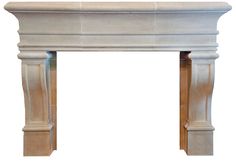 a white marble fireplace mantel with columns