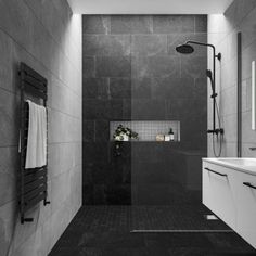 a black and white photo of a bathroom