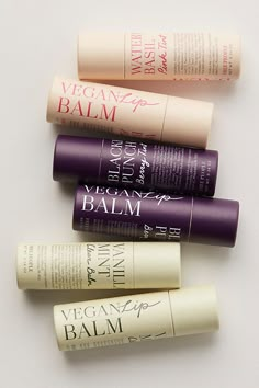 Formulated with a blend of natural butters and oils, this daily, plant-based lip balm nourishes and protects the lips in three juicy flavors. Grapeseed oil and sunflower seed oil nourish and soften; shea butter and cocoa butter condition and protect; and candelilla wax provides a moisturizing, breathable barrier. Packaged in a 100% recyclable FSC paper tube. * 0.35 oz. * Vegan & Cruelty-free * Free of parabens, petroleum and artificial colorants * Made in the USA **Sweet Vanilla Mint Flavor:** C Lip Balm Paper Tube, Beauty Label Design, Lip Balm Packaging Ideas, Lip Balm Photography, Lip Balm Design, Small Business Ideas Products, Balm Packaging, Cruelty Free Mascara, Packaging Design Beauty