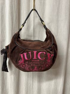 Juicy Couture Brown Pink Velvet Purse Handbag Leather trim Cute tie pocket on side. Clean leaning no piling on the Hello and Shopping? Pockets inside. Has some peeling on edges(please see photos). Very Good Vintage Condition Please see pictures for more details. Please note that vintage items are not new and may have minor imperfections. For more details and information please send a personal message. You can ask me any question before buying. WORLDWIDE SHIPPING by  DHL Express Estimated time of Designer Shoulder Bag With Pockets For Daily Use, 90s Purses, Juicy Couture Vintage, Outfit Creator, Fancy Purses, Vintage Juicy Couture, Betsey Johnson Purses, Velvet Purse, Handbag Leather