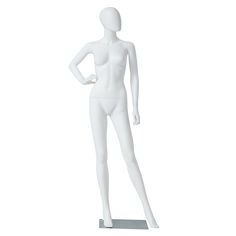 a white female mannequin standing on a metal base