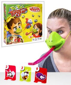 a woman wearing a face mask with three game pieces in front of her and the box behind her