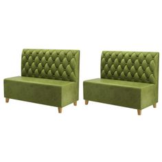 two green couches sitting next to each other