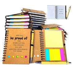 notebooks, pens and notepads are stacked on top of each other with the words may you be proud of