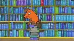 an orange dog is sitting on top of books in front of a bookcase full of books