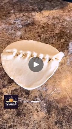 an uncooked pie sitting on top of a counter