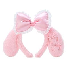 two pink mittens with bows on them