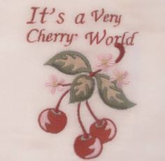 it's a very cherry world with cherries and leaves on white fabric,