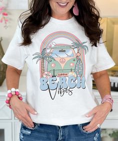 Introducing our "Beach Vibes" Graphic Shirt, the ultimate addition to your summer wardrobe that captures the essence of a perfect beach vacation. Available in sizes YXS to 5XL, this shirt ensures a comfortable and flattering fit for everyone.
The graphic design features a serene beach scene accompanied by the phrase "Beach Vibes," bringing the laid-back, sunny atmosphere of the beach to your everyday life. Whether you're planning a beach getaway, reminiscing about past vacations, or simply want to spread positive, summery vibes, this shirt is perfect for you.
Crafted from high-quality fabric, our shirt offers exceptional softness and durability, making it ideal for all your summer adventures. Whether you're lounging by the shore, strolling along the boardwalk, or just enjoying a casual day Beachy Style, Fall Football, Beach Birthday, Black Friday Christmas, Beach Getaway, White Headband, Rain Gear, Beach Getaways, Summer Adventures