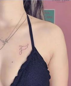 a woman with a tattoo on her chest