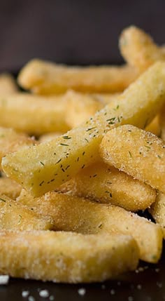 a pile of fried food sitting on top of a table