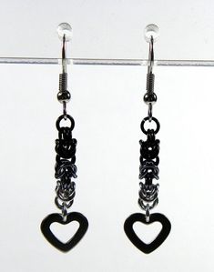 Black Dangle Heart Pierced Earrings, Black Heart Earrings With Ear Wire, Black Heart-shaped Earrings With Hooks, Handmade Black Dangle Heart Earrings, Handmade Black Heart Dangle Earrings, Heart-shaped Black Earrings, Gothic Black Heart-shaped Earrings, Handmade Black Heart Earrings, Black Heart Drop Earrings