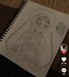 a drawing of a virgin mary with roses and a butterfly on her shoulder, next to an instagram sticker