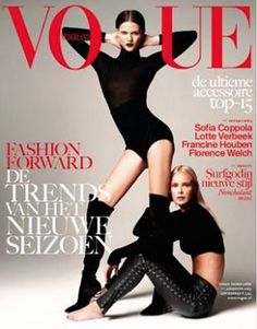 two women on the cover of a magazine, one in black and one in white