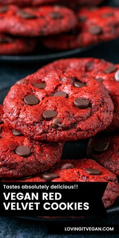 vegan red velvet cookies stacked on top of each other with chocolate chips in the middle