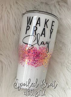 a white tumbler with pink and gold sprinkles on it that says wake pray slay spoiled brat design