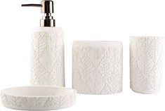 a white bathroom set with soap dispenser and toothbrush holder