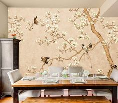 the dining room table is set with place settings for two people to sit and eat