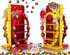 an image of a candy machine with balls coming out of it and on the ground