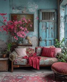 a living room filled with furniture and lots of pink flowers in vases on the wall