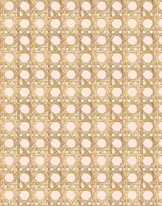 a beige and pink pattern with circles on it's side, as well as the background