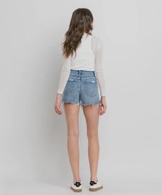 HIGH RISE A LINE DENIM SHORTS COMFORT STRETCH DENIM, HIGH RISE WAIST, DISTRESSED DETAIL, RAW HEM, A LINE DENIM SHORTS F . RISE: 10" / INSEAM: 3 3/4" / LEG OPENING: 23 1/2" MODEL IS 5'9" WEARING SIZE 26 Dark Wash Jean Shorts With Built-in Shorts, Medium Wash Stretch Shorts, Stretch Jean Shorts In Medium Wash, Casual Stretch Cutoff Jean Shorts, Stretch Medium Wash Shorts, Casual Frayed Hem Shorts, Casual Shorts With Frayed Hem, Spring Jean Shorts With Pockets, Medium Wash Stretch Cutoff Shorts