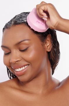 What it is: A scalp brush that's a dream for using to gently remove buildup, stimulate the scalp and create an overall relaxing experience.Who it's for: All hair types.What it does: This silicone brush supports a healthy scalp and hair by gently stimulating the scalp and hair follicles and helping to decongest clogged pores and improve circulation. How to use: Use in the shower while applying Hydrating Shampoo, Detox Scalp Scrub or ACV Rinse. Gently massage your scalp with medium pressure to sti Rizos Curls, Scalp Massage Brush, Scalp Brush, Scalp Hair Growth, Exfoliate Scalp, Scalp Brushing, Strengthen Hair Follicles, Massage Brush, Scalp Scrub