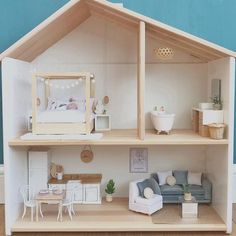 a doll house with furniture and accessories in it