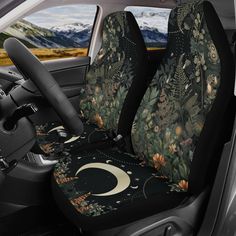 the interior of a car with flowers and plants all over it's seat covers