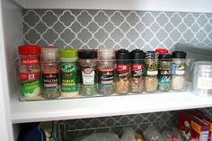 an organized pantry with spices and seasonings