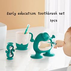 a baby brushing its teeth with toothbrushes in front of it and other toys