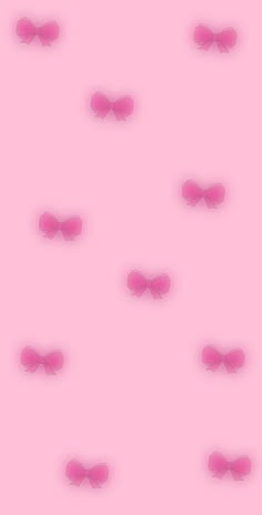 a pink background with bows on it