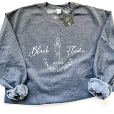 Black Flame Candle Company Halloween Crewneck Sweatshirt The Black Flame Candle, Company Halloween, Halloween Crewneck Sweatshirt, Black Flame Candle, Flame Candle, Black Flame, Halloween Crewneck, Candle Company, Crewneck Design