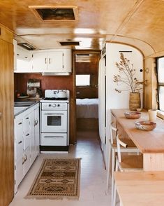 the kitchen and living area of an rv