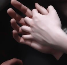 two hands reaching out to touch each other