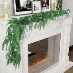 a decorated fireplace mantel with candles and christmas decorations on it, along with photos